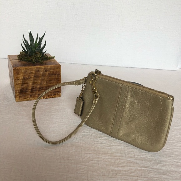 Coach Handbags - Gold Coach Wristlet